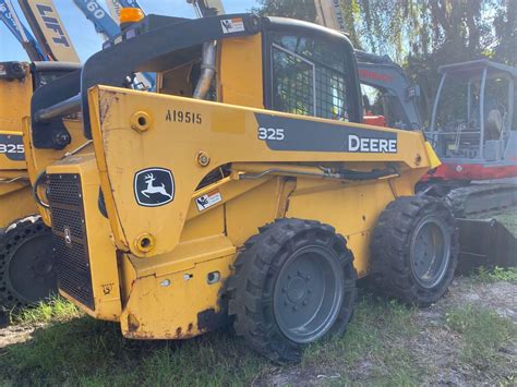 john deere 325 skid steer cab tilt|JD John Deere Skid Steer Raise Cab to access the engine..